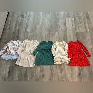 Set of 4 dresses and a top to wear with leggings. All in great condition! Size 4